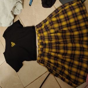 2 piece sunflower shirt. Yellow and black skirt